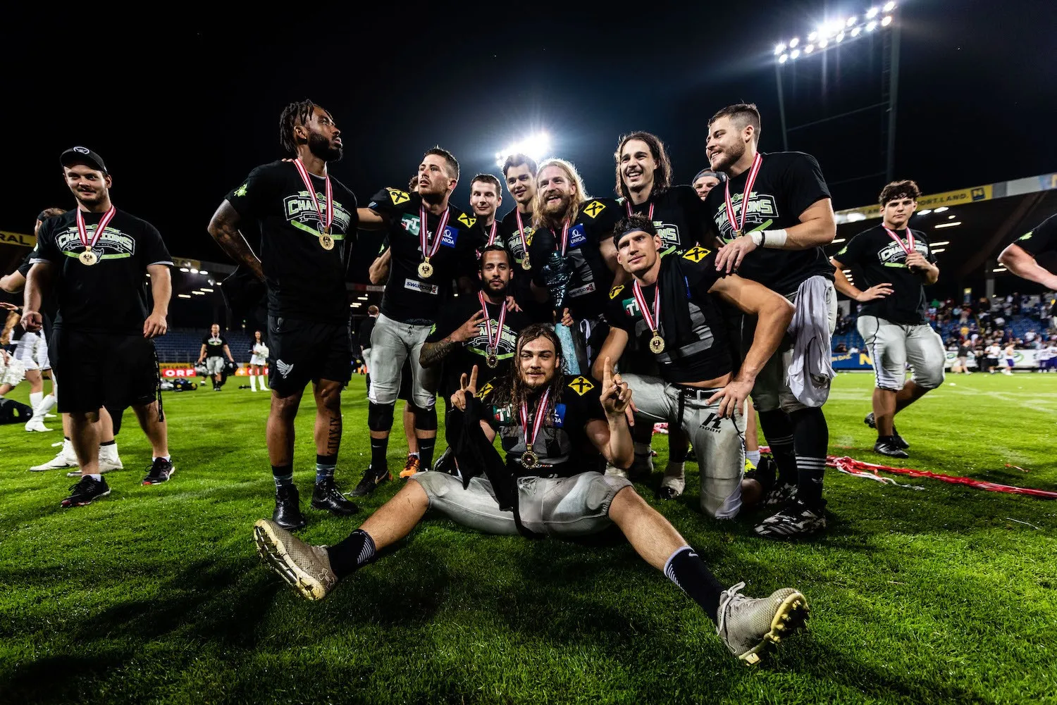Swarco Raiders Tirol football team celebrating in the stadium
